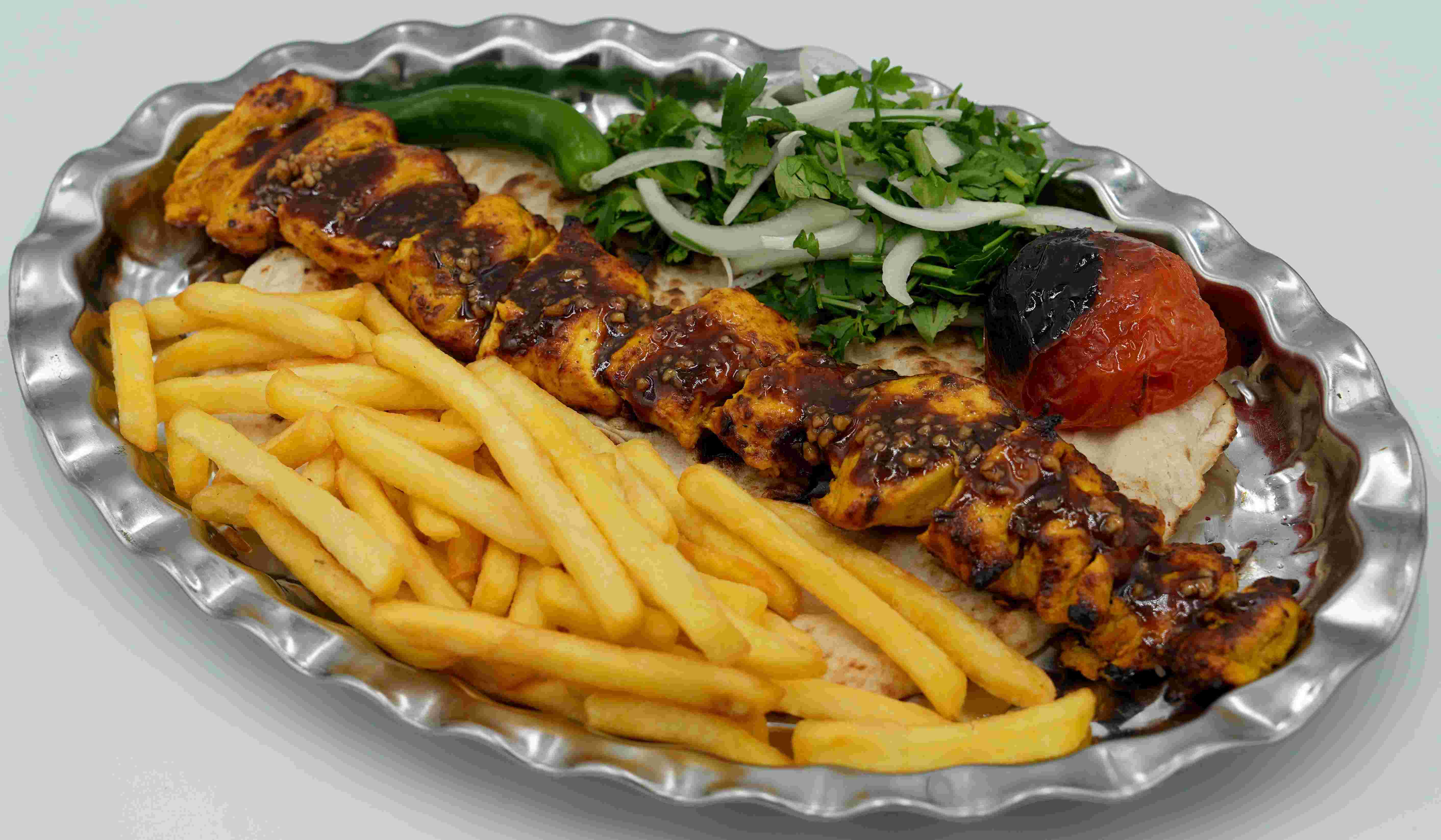 جوجه طاووق ترش/حامض مع بطاط